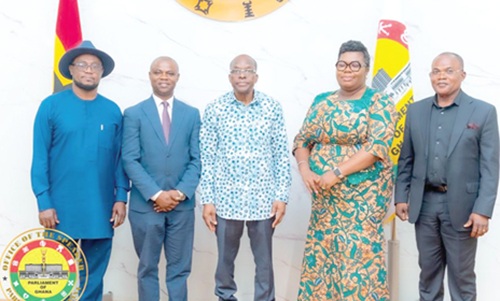  Alban Sumana Kingsford Bagbin (middle), Speaker of Parliament, with members of the Parliamentary Service Audit Committee after their inauguration