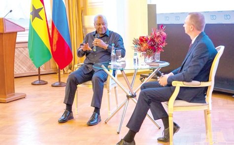 President John Mahama (left) answering questions during the dialogue session