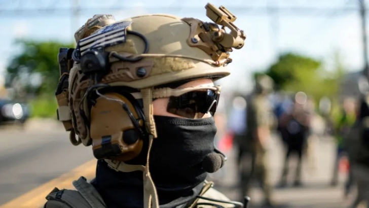 US immigration agents often work with their faces covered and do not wear identification.