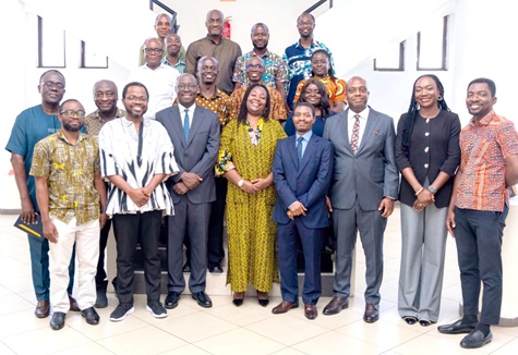 Dr Cassiel Ato Forson (3rd from left), Minister of Finance, Thomas Nyarko Ampem (3rd from right), Deputy Minister of Finance, and participants after the event