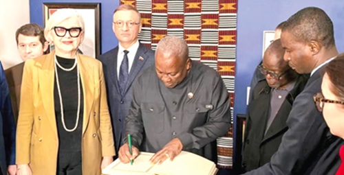 President John Mahama signing a visitors’ book after inspecting the exhibitionPresident John Mahama signing a visitors’ book after inspecting the exhibition
