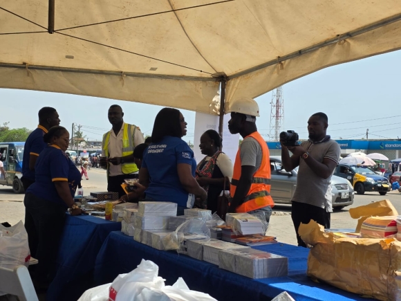 ECG engages customers Tema Community One market