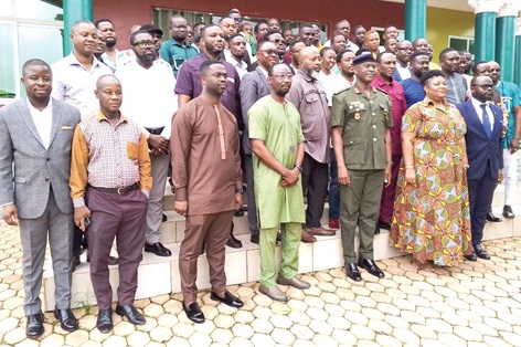 Major General Timothy Ba-Taa-Banah (3rd from right), the Director of the National Counter Terrorism Fusion Centre, Bernice Hiadzi-Hetor (2nd from right), Second-in-Command, Strategic Communication at the NSCS, and journalists after the engagement