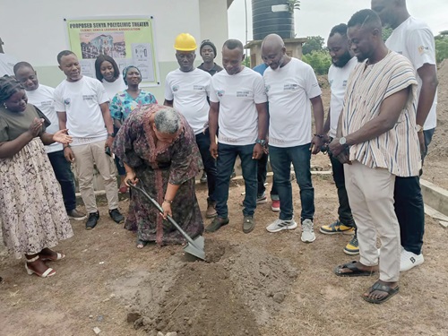 Gizella Tetteh-Agbotui, the Deputy Minister of Works, Housing and Water Resources, cutting the sod for the theatre project. Looking on are members of the Senya Legends Association