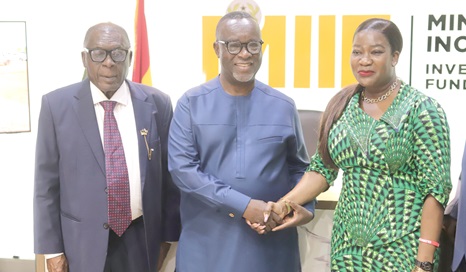 Justina Nelson (right) exchanging pleasantries with Chief Justice Paul Baffoe-Bonnie (2nd from right) after the meeting. With them is Richard Kwame Asante (left), Board Chairman of MIIF. Picture: EDNA SALVO KOTEY