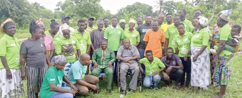 Sumaila S. Saaka (seated middle), Executive Director of FONAR, with  Adams Musah (seated left), the Nabdam District Crop Officer, and other participants