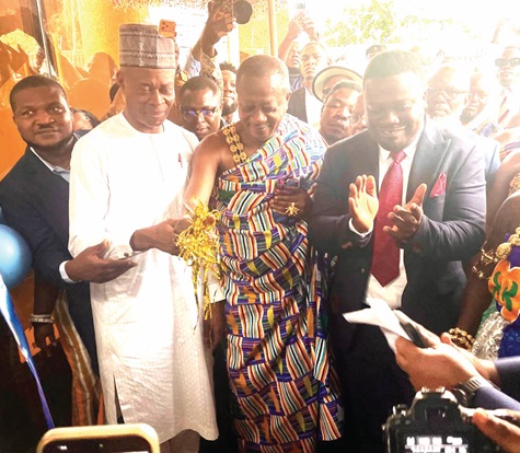 Baffour Owusu Amankwatia VI (middle), the Bantamahene, and Yusif Sulemana (2nd from left), Deputy Minister of Lands and Natural Resources, cutting the tape to inaugurate the facility With them is Dr Frank Amoakohene (right), the Ashanti Regional Minister. RIGHT: The front view of the new office.