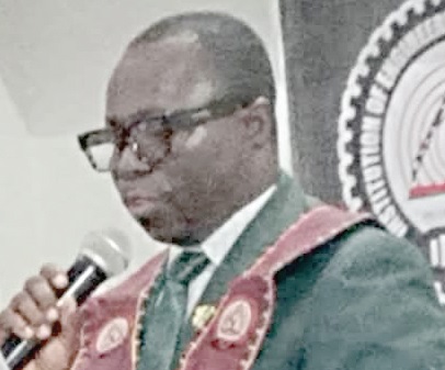 Wonder Salami Davor (inset), President, IET-GH, administering the oath at the induction of 130 engineers