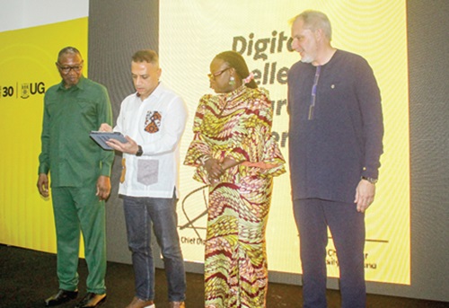 Ibrahim Misto (2nd from left), Chief Digital Officer, MTN Ghana, signing the agreement. Looking on are Prof. Nana Aba Appiah Amfo (2nd from right), VC, UG-Legon; Stephen Blewett (right), CEO, MTN Ghana, and Dr Clement Abas Apaak (left), Deputy Minister of Education. Picture: ERNEST KODZI