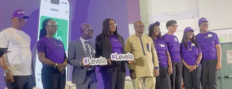 Jane Mingle (4th from left), Chief Executive Officer, Prudential Life Insurance Ghana (PLIG), with Dr Emmanuel Newman, (middle), Director of Tertiary Education of the Ministry of Education, and Senior Management members of PLIG at the ceremony