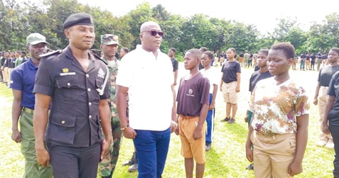 Rtd David Eklu (2nd from left), Deputy Commissioner of Police (DCOP), Executive Director of the MISORNU Safety Centre, inspecting the parade. With him is Chief Inspector Benard Bestman-Afful (left), Yamfo Station Officer