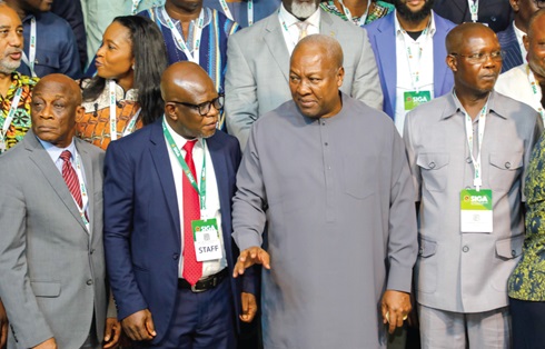 President John Dramani Mahama interacting with Prof. Michael Kpessa-Whyte (2nd from left), Director-General, SIGA, at the conference. With them are Bernard Ahiafor (right), First Deputy Speaker of Parliament, and Seth Terkper (left), Presidential Advisor on the Economy. Picture: ELVIS NII NOI DOWUONA