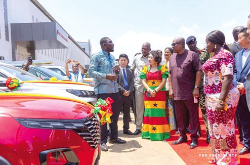 President John Dramani Mahama (2nd from right), with Elizabeth Ofosu-Adjare (right), Minister of Trade, Agribusiness and Industry, and other dignitaries being briefed about the products President John Dramani Mahama (2nd from right), with Elizabeth Ofosu-Adjare (right), Minister of Trade, Agribusiness and Industry, and other dignitaries being briefed about the products