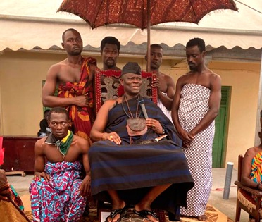 Oseadeeyo Dr Frimpong Manso IV (seated), Omanhene of Akyem Kotoku Traditional Area, delivering his address at the ceremony