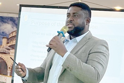 Dr Wallace Odiko-Ollennu, Programme Manager,  Non-Communicable Disease  Control Programme of the Ghana Health Service, making his presentation
