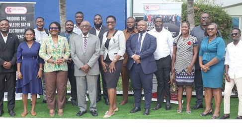 Felix Addo (4th from left), President, Chartered Institute of Restructuring and Insolvency Practitioners Ghana, with the governing council of CIRIP and journalists after the Editors Forum. Picture: BENEDICT OBUOBI
