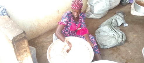 Nayila Mohammed processing shea into shea butter Nayila Mohammed processing shea into shea butter