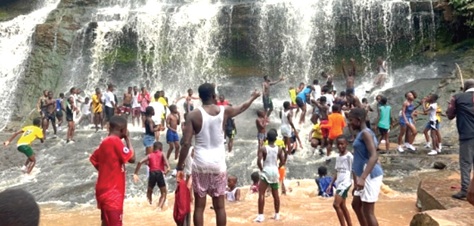 Some tourists at the Kintampo Waterfalls Some tourists at the Kintampo Waterfalls