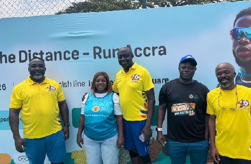 Benjamin Ahulu (middle) Chairman, Dansoman Keep Fit Club with officials of FNB