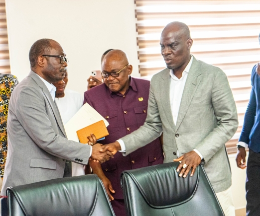Haruna Iddrisu (right), Minister of Education, in a handshake with Prof. Ernest Kofi Davies (left), Director General, Ghana Education Service, after the meeting with the three-teacher unions. With them is Dr George Smith-Graham (middle), Chief Executive Officer, Fair Wages and Salaries Commission