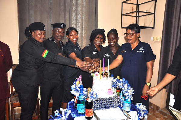 DCOP Andrews Boadu-Ekumah, Volta Regional Police Commander, Superintendent Benedicta Ansah, President of POLAS Volta (third right) and other members of POLAS Volta jointly cut the cake to mark the inauguration of the birthday platform of the association