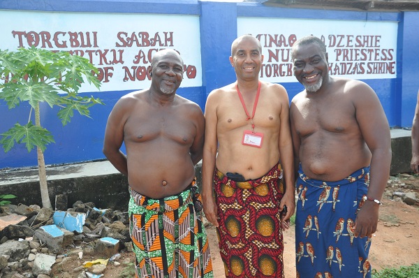 Alberto Mario Noretti, the writer, flanked by Gavivina Tamakloe (left) and Nufialaga Kobla Mawufemor Nornyibey outside the Torgbui Zakadza Temple.