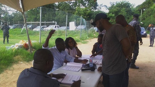 Voters at the Tema Central Constituency going through the voting process