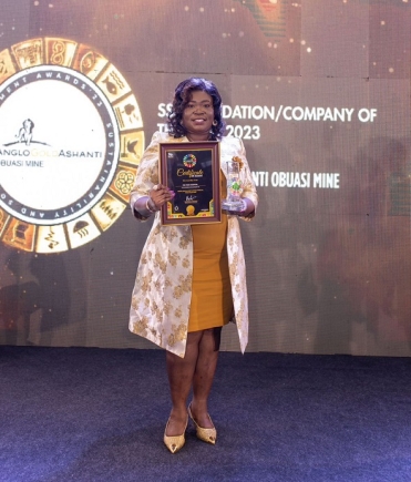 Dr Juliana Oye Ameh displaying one of the citations 
