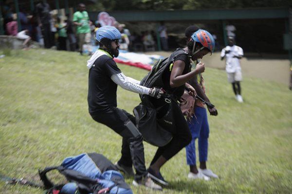 A patron of the paragliding getting ready for a flight