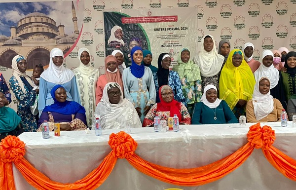 A group photograph of the participants and keynote speakers ( seated in front )