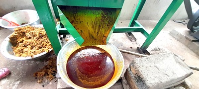 The oil being drained from the oily water in the machine