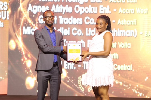 East Volta based, Wofa Kuma Enterprise receiving award for Best Kremela Distributor.