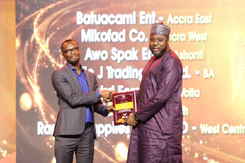 Accra East based, Batucami Enterprise receiving award for GTM Area Best Distributor.