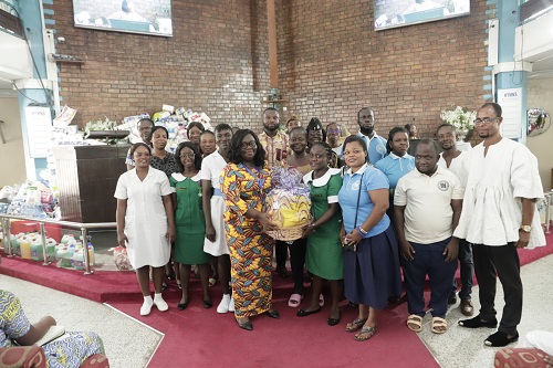 Mrs Nana Ama Acheampomaa Badasu in a group photo with the beneficiary organisations