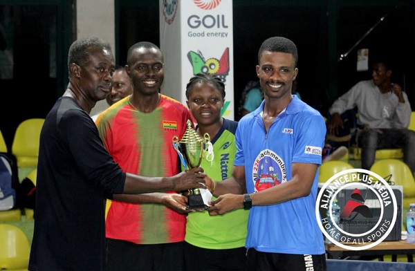 Derek Abrefa (2nd left) and Emmanuel Asante (right) receiving their awards from a greater Accra table tennis official