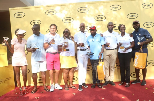 Some winners displaying their trophies