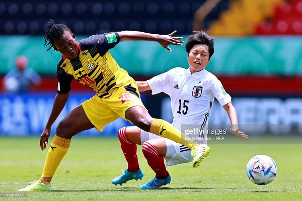 Susu Amano of Japan and Cecilia Nyama (left) of Ghana fight for the ball in yesterday's clash at the Estadio Alejandro Morera Soto, Costa Rica