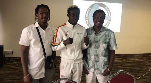 Samuel Takyi (middle) with his trainer Ike Quartey (right) and his manager Clement Quartey