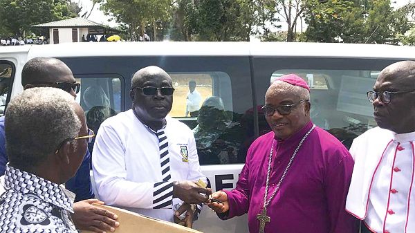 Mr Ernest Bediako Sampong (second left) presenting the keys of the vehicle to the Chairman of the Board of Governors of Adisadel College and the Anglican Bishop of Cape Coast, Rt.Rev. Reginald Atta- Baffoe. INSET: The vehicle donated by Ernest Chemists Limited