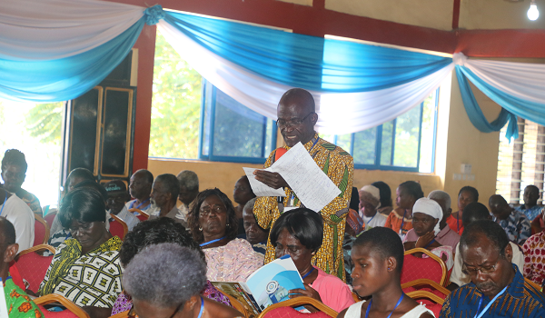 A customer asking a question during the AGM A customer asking a question during the AGM