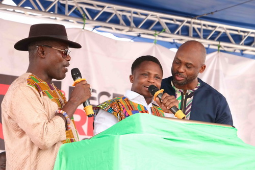 Boxer Isaac Dougbe and his 'corner' were at the event where he urged the youth to rise to the nation's call for patriotism, devotion and commitment