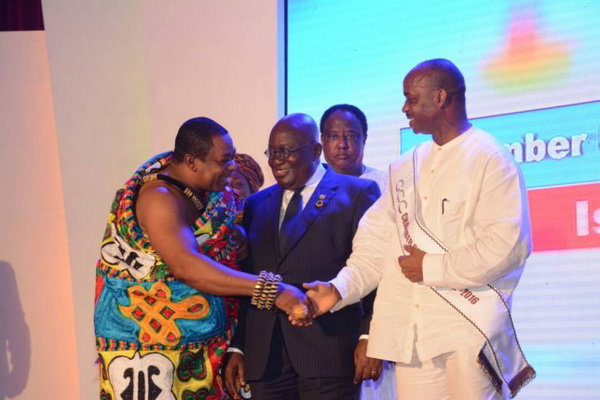B-BOVID CEO Issa Ouedraogo on stage with President Akufo-Addo and other dignitaries after picking his award. B-BOVID CEO Issa Ouedraogo on stage with President Akufo-Addo and other dignitaries after picking his award.