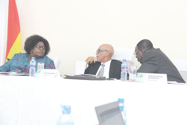  Justice Emile Short (middle) interacting with Prof. Henrietta Mensa-Bonsu (left), and Mr Patrick Kwarteng Acheampong (right) during the committee sitting in Accra. Pictures: BENEDICT OBUOBI