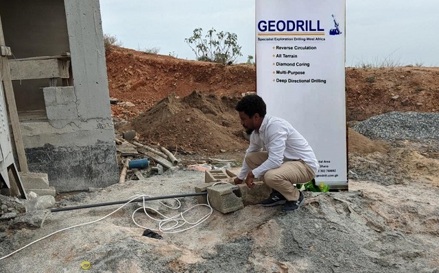 A representative of Geodrill testing the borehole at the construction site