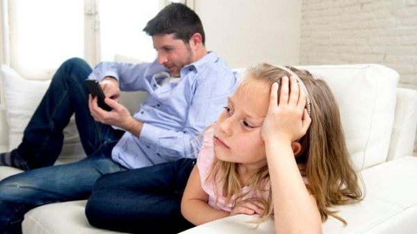 Dad on phone forgetting daughter Dad on phone forgetting daughter