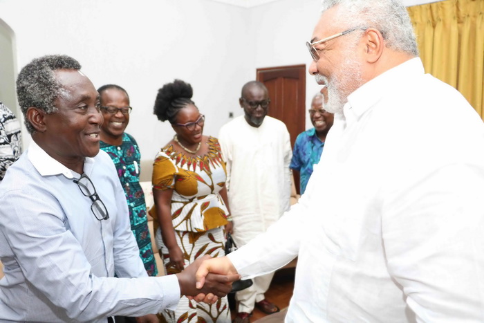 Co-Director of the play The Trial of JJ Rawlings in a handshake with JJ Rawlings Co-Director of the play The Trial of JJ Rawlings in a handshake with JJ Rawlings