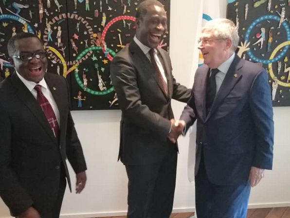 Ghana's Ambassador to Switzerland HE Ramsis  Cleland, and the GOC PRESIDENT Ben NUNOO MENSAH sharing a hearty chat with the IOC President Thomas Bach at the IOC Head Office in Lausanne Switzerland.
