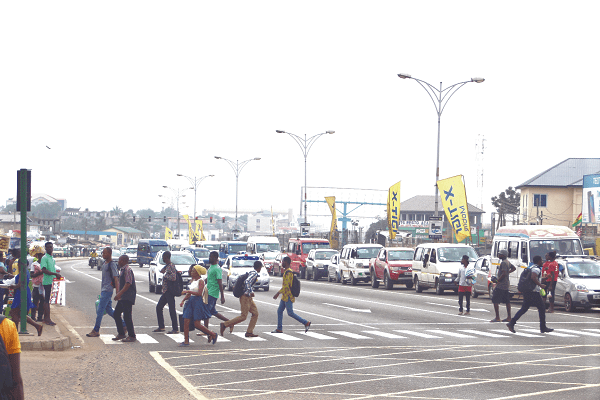 Pedestrians rushing to cross the zebra crossing at Abeka Lapaz in Accra to avoid being knocked down by vehicles. Pedestrians rushing to cross the zebra crossing at Abeka Lapaz in Accra to avoid being knocked down by vehicles.