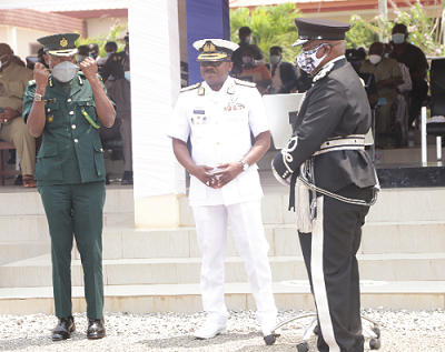 Mr Kwame Asuah Takyi (left), Comptroller-General, Ghana Immigration Service, Mr James Oppong- Boanuh (right), outgoing Inspector General of Police, and Vice Admiral Seth Amoama (2nd right), Chief of the Defence Staff of the Ghana Armed Forces, in an interaction after the ceremony. Picture: EDNA SALVO-KOTEY