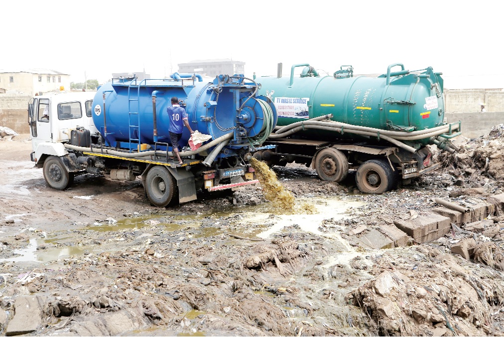 kpone landfill Two of the trucks discharging waste